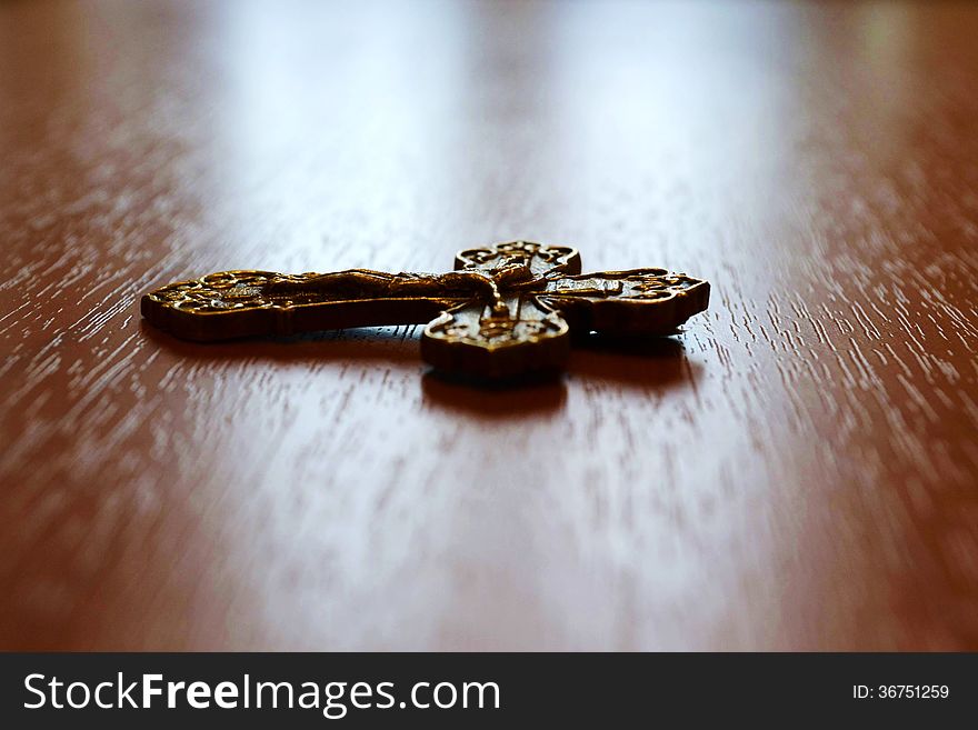 Orthodox cross on the table