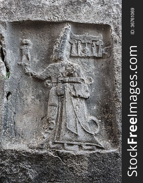 Rock carving in YazÄ±lÄ±kaya depicting god Sharruma and King Tudhaliya dated to around 1250 - 1220 BC. Rock carving in YazÄ±lÄ±kaya depicting god Sharruma and King Tudhaliya dated to around 1250 - 1220 BC.
