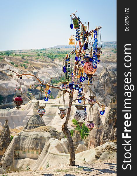 Turkish souvenirs hanging on dry tree in Cappadocia. Turkish souvenirs hanging on dry tree in Cappadocia