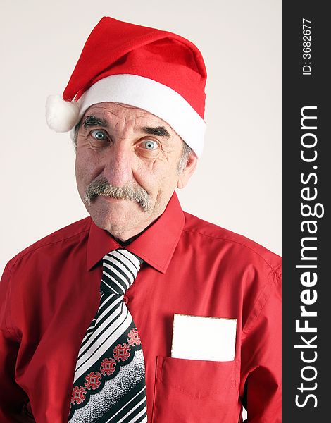 Man with santas's hat with a white card on white background. Man with santas's hat with a white card on white background