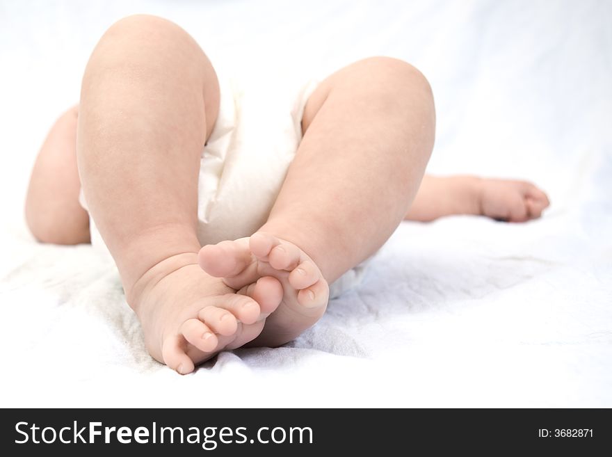 Newborn's feet on white background. Newborn's feet on white background