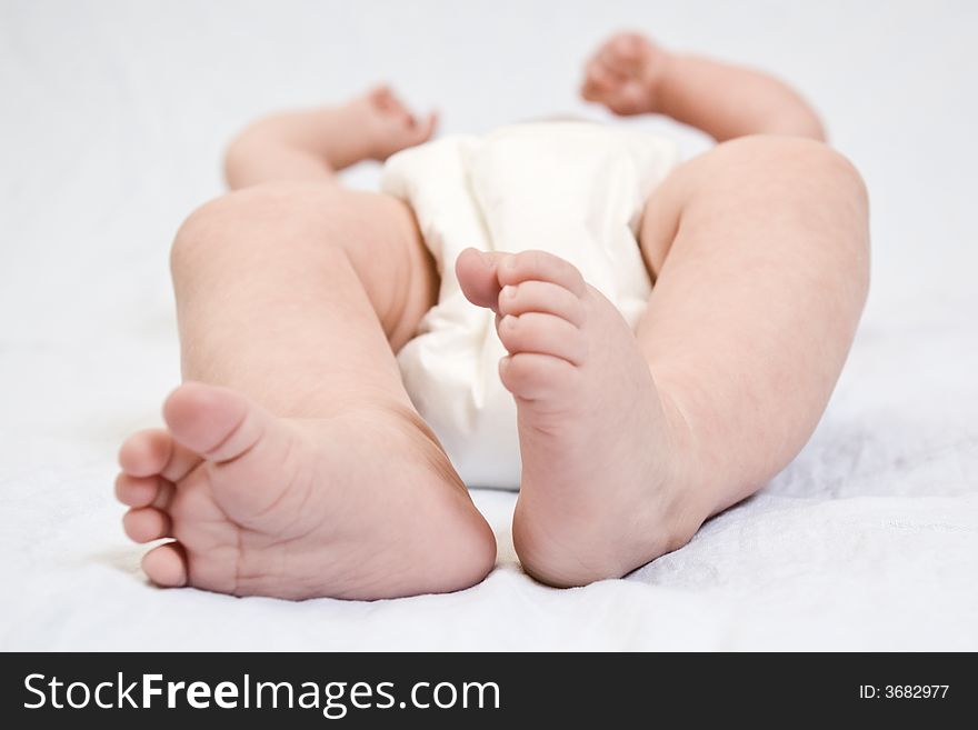 Newborn's feet on white background. Newborn's feet on white background