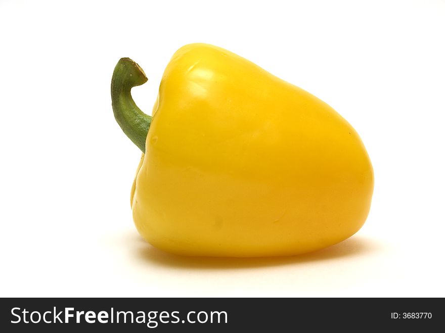 Yellow pepper on the white background