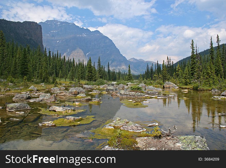 A small lake at the end of a hike near Moraine Lake in Banff NP, Canada. . A small lake at the end of a hike near Moraine Lake in Banff NP, Canada.