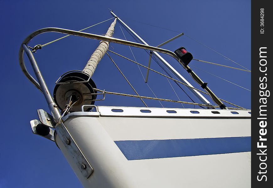 Prow of a white sailboat. Prow of a white sailboat