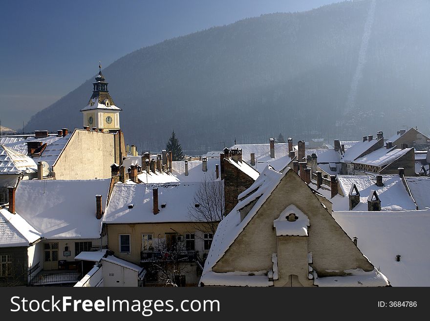 Scenic view on rooftops in Brasov Romania. Winter time. Scenic view on rooftops in Brasov Romania. Winter time