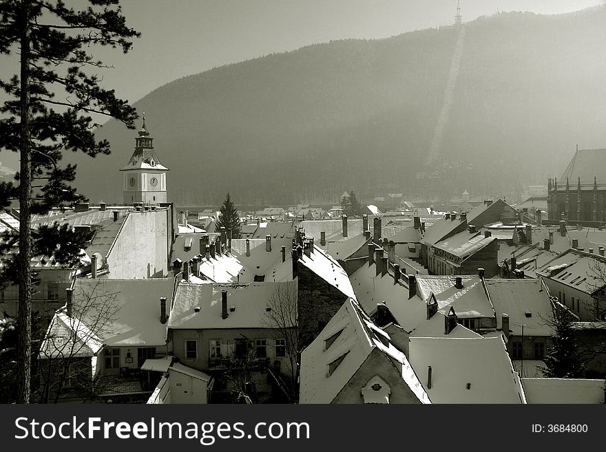 Scenic view on rooftops in Brasov Romania. Winter time. Scenic view on rooftops in Brasov Romania. Winter time