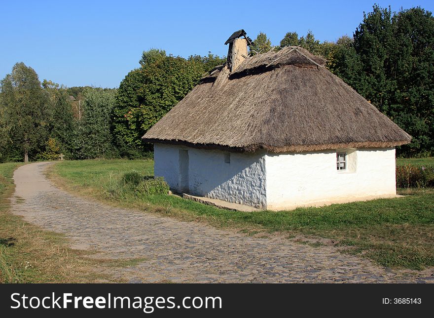 Old ukrainian house near the road. Old ukrainian house near the road