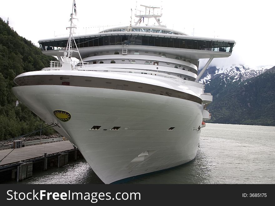 Cruise ship at port in Alaska on a cloudy day