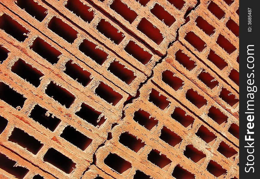 Red clay bricks stacked in a construction site. Red clay bricks stacked in a construction site