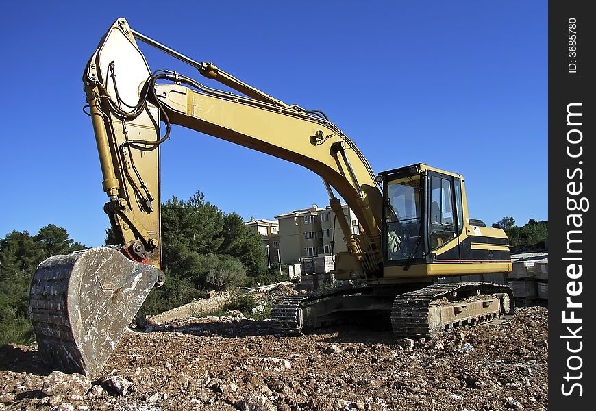 Bulldozer working in a construction site in Spain. Bulldozer working in a construction site in Spain