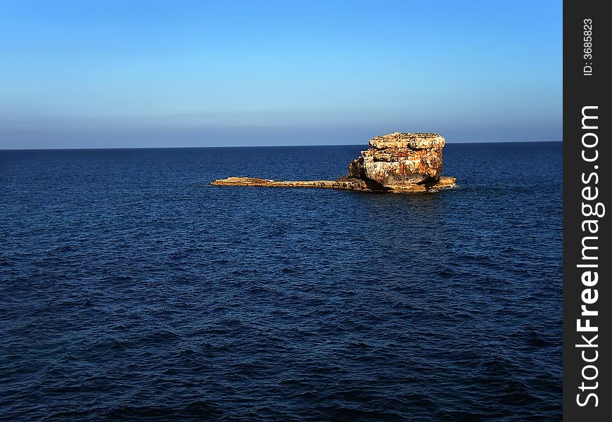 Small islet in the Balearic Islands coast