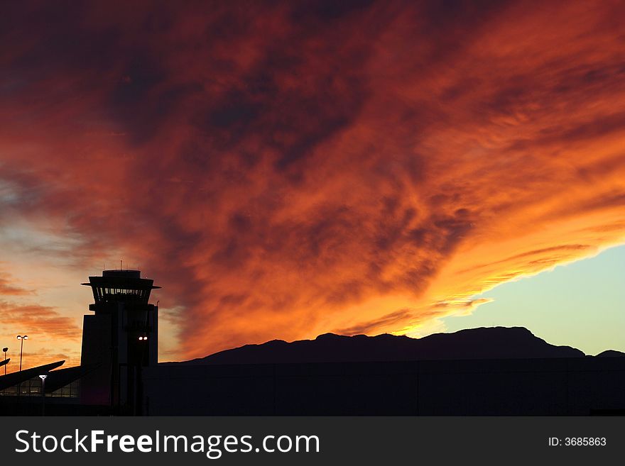 Air control tower at McCarran International Airport, Las Vegas, Nevada at sunset.