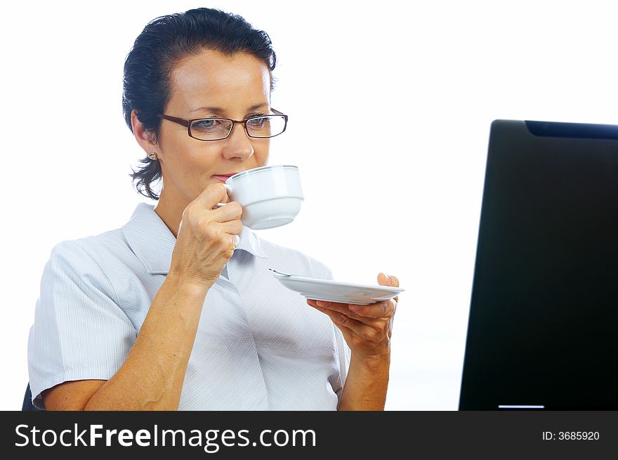 portrait of  businesswoman drinking coffee in office environment. portrait of  businesswoman drinking coffee in office environment