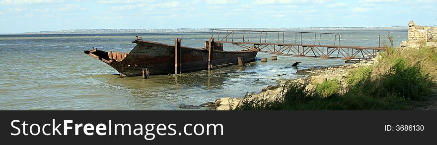 Lonely rusty ship