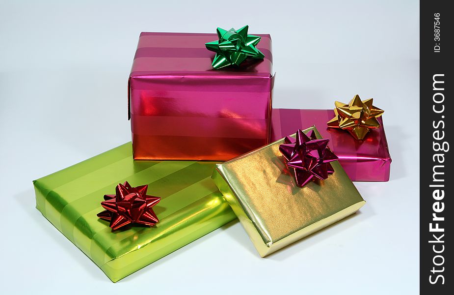 Gift boxes with ribbons on white background. Gift boxes with ribbons on white background