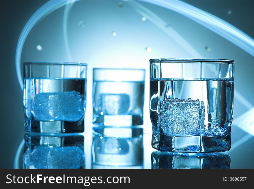 Three glasses of  pure mineral water. Three glasses of  pure mineral water