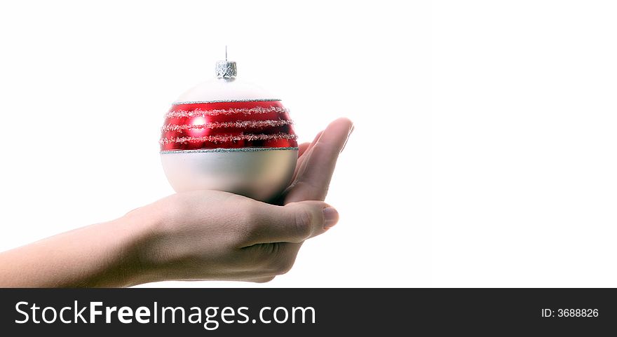 A young woman holds a christmas glitter ball. Isolated over white with a lot of space for text!. A young woman holds a christmas glitter ball. Isolated over white with a lot of space for text!