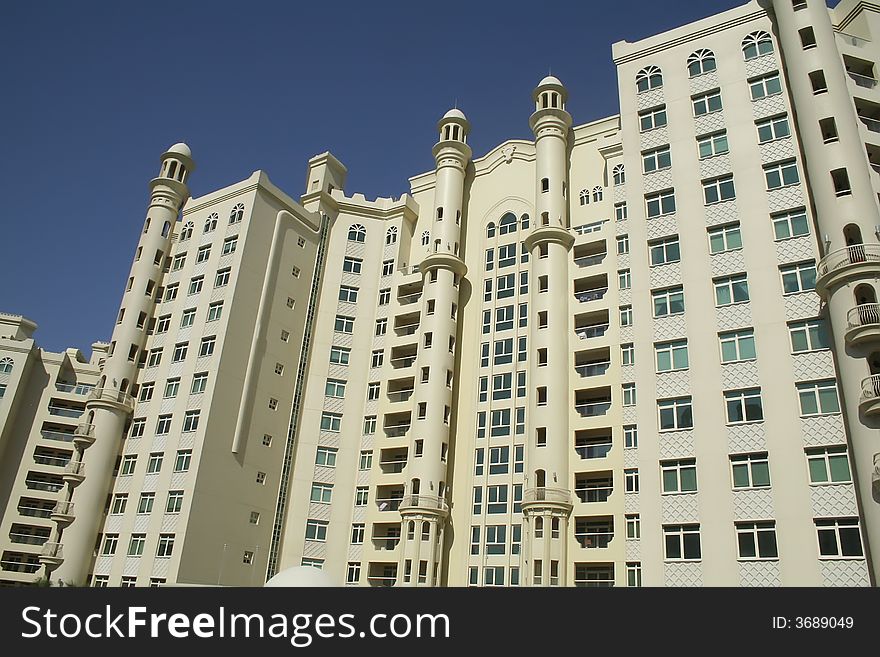 Shot of big building from road side.