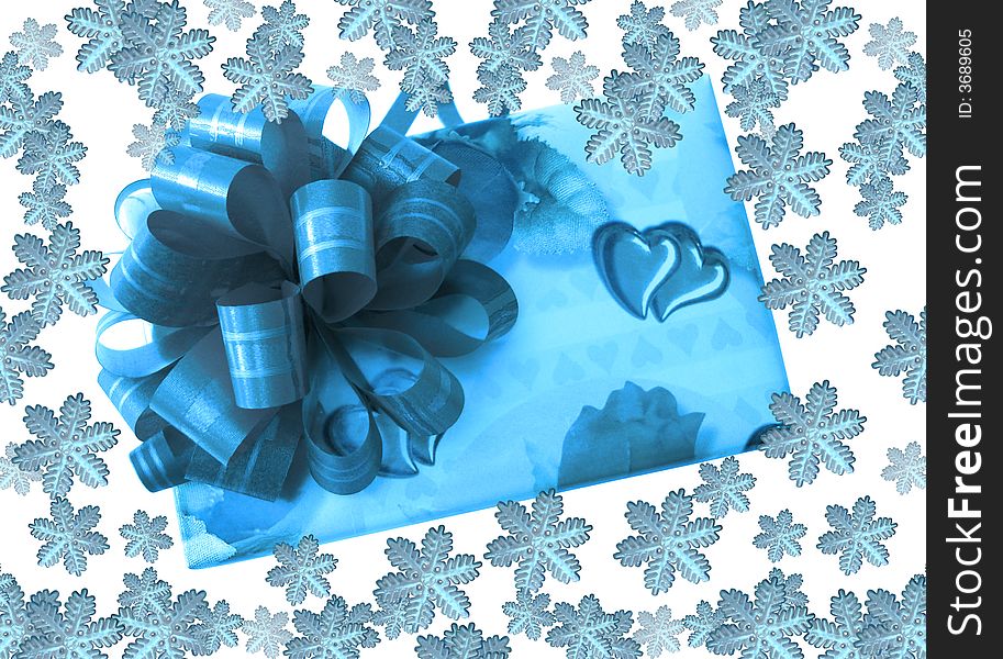 Celebration box with snowflakes over white background