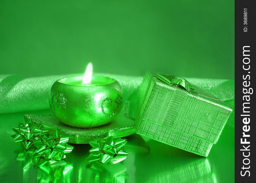 Green candle and gift box