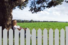 Young Beauty Woman Sit Under Alone Tree In Field Stock Photos Young Beauty Woman Sit Under Alone Tree In Field Stock Photos