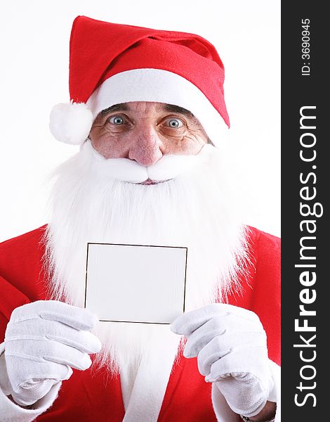 Santa holding a small blank white card. Santa holding a small blank white card