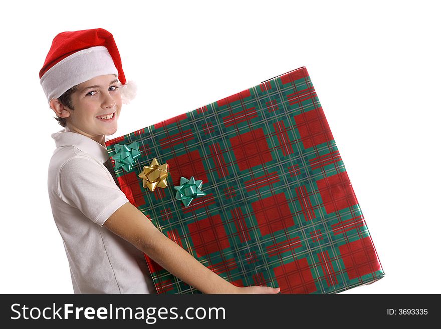 Shot of a child holding christmas present