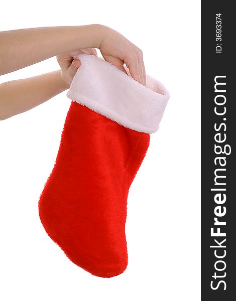 Photo of a childs hand reaching into stocking