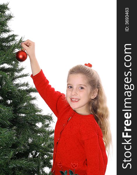 Photo of a Happy child hanging ornament