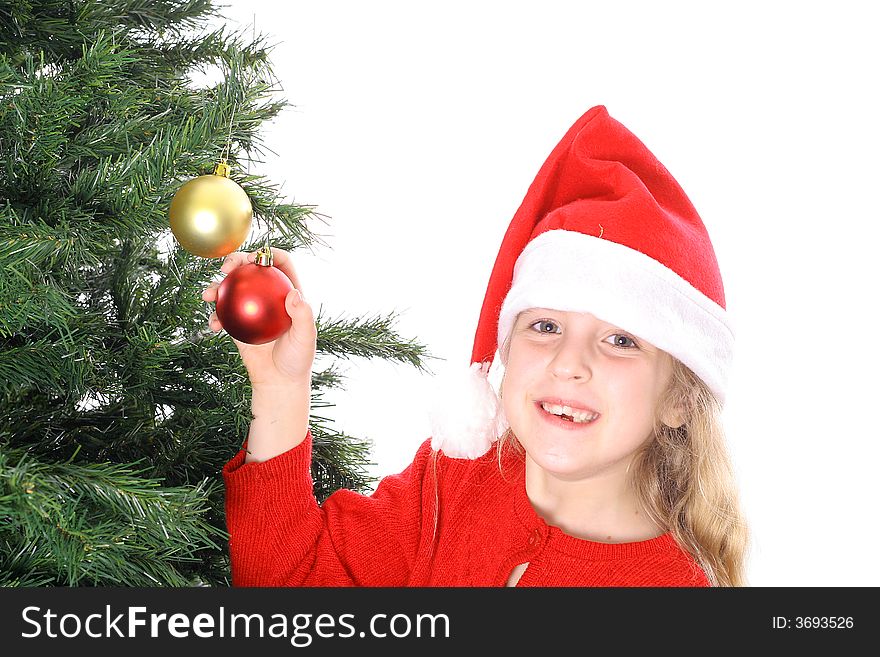 Photo of a Santa child hanging ornaments