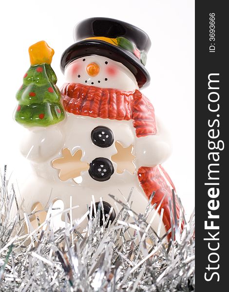 Snowman on white, porcelain, christmas. Snowman on white, porcelain, christmas