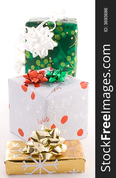 Christmas gifts, presents, wrapped with decorative stars and ribbons