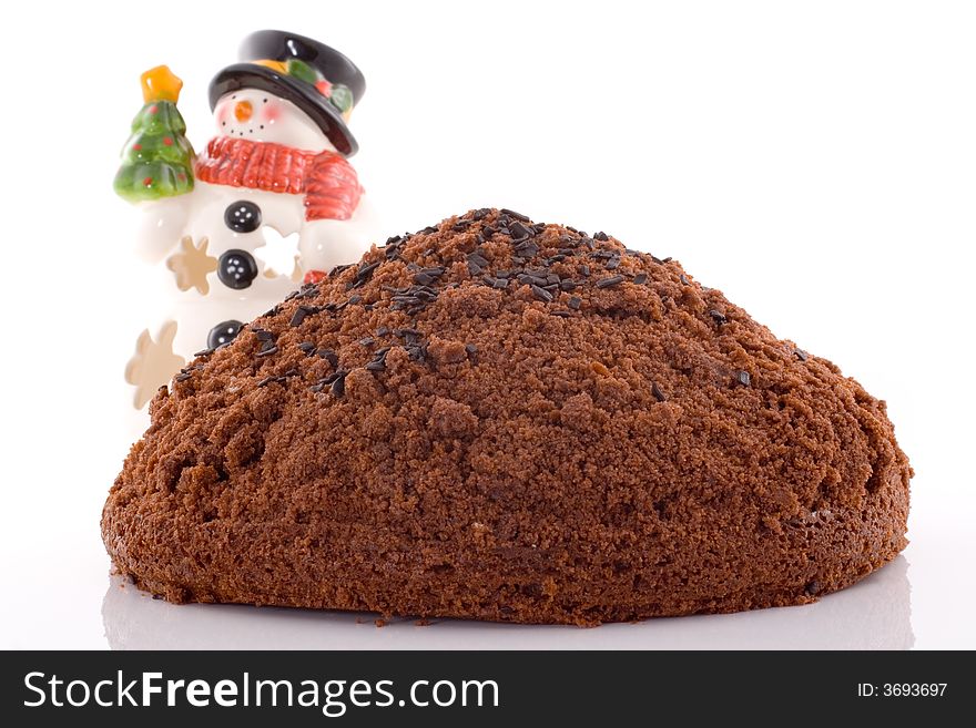 Chocolate cake on white background with snowman, christmas. Chocolate cake on white background with snowman, christmas