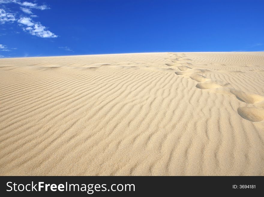 Amazing view of sand dunes against deep blue sky, clear, versatile stock image. Amazing view of sand dunes against deep blue sky, clear, versatile stock image