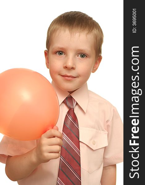A boy with a balloon in his hands