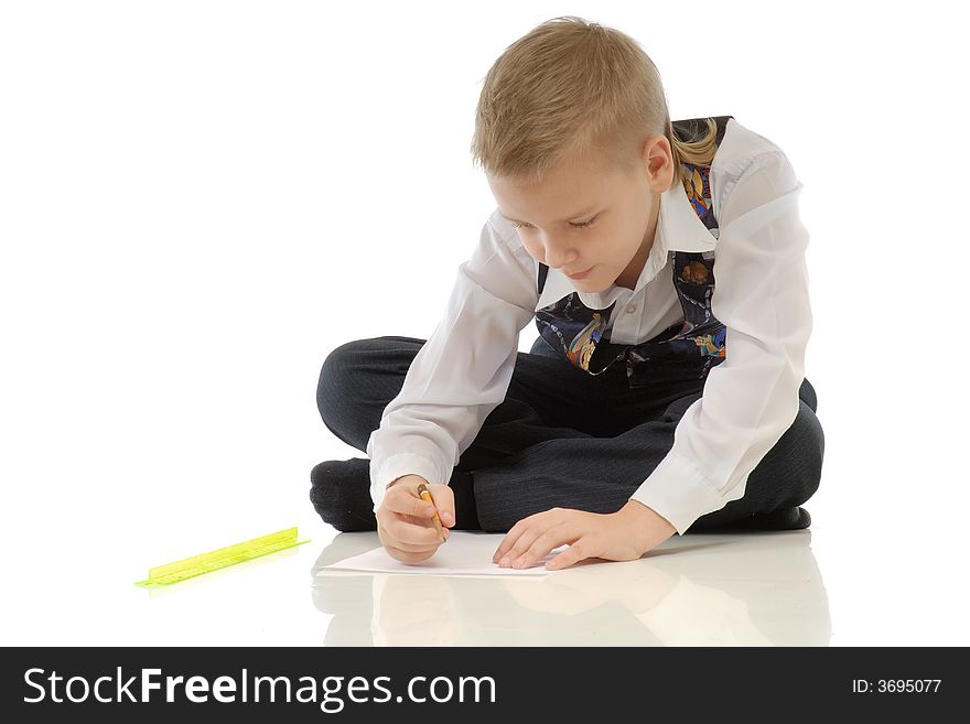 The schoolboy drawing on a white background. The schoolboy drawing on a white background