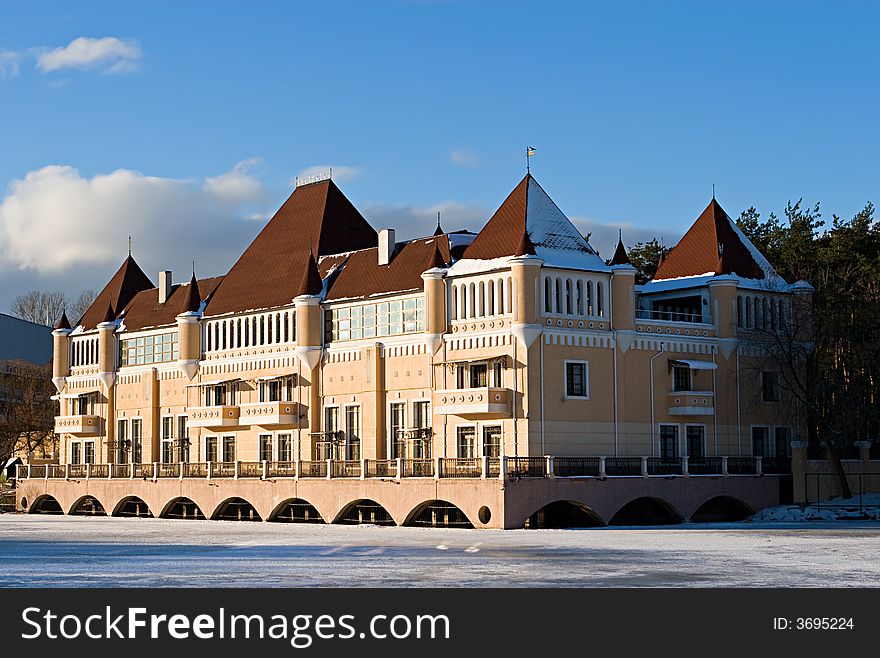 Beautiful country house near to the river covered with ice