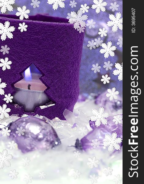 Festive new-year candle with snowflakes