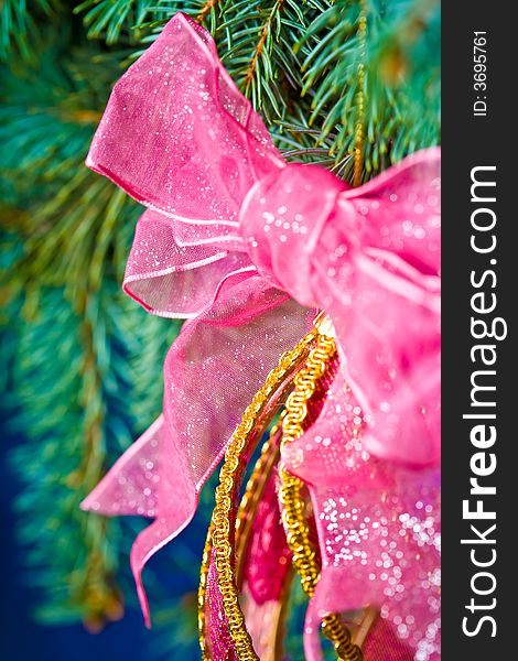 Close up view of the christmas ornament,
christmas, decoration, ornament, tree, holiday, red, celebration, night, lights, season, ribbon, illuminated, shiny, winter, sphere, bow, gold, traditional, paper, green, ball, home, interior, light, pine, color, december, branch, image, indoors, backgrounds, lighting, equipment, glass, decorating