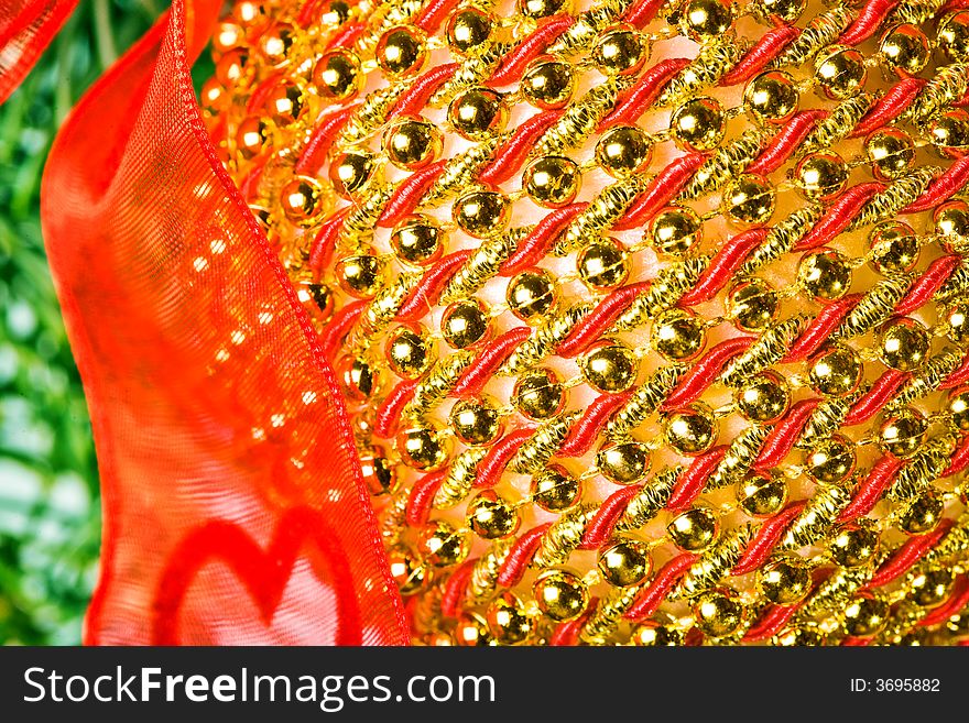 Close up view of the christmas ornament,
christmas, decoration, ornament, tree, holiday, red, celebration, night, lights, season, ribbon, illuminated, shiny, winter, sphere, bow, gold, traditional, paper, green, ball, home, interior, light, pine, color, december, branch, image, indoors, backgrounds, lighting, equipment, glass, decorating