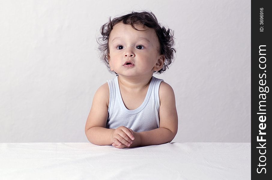 Portrait of the child with a thoughtful sight. Portrait of the child with a thoughtful sight.