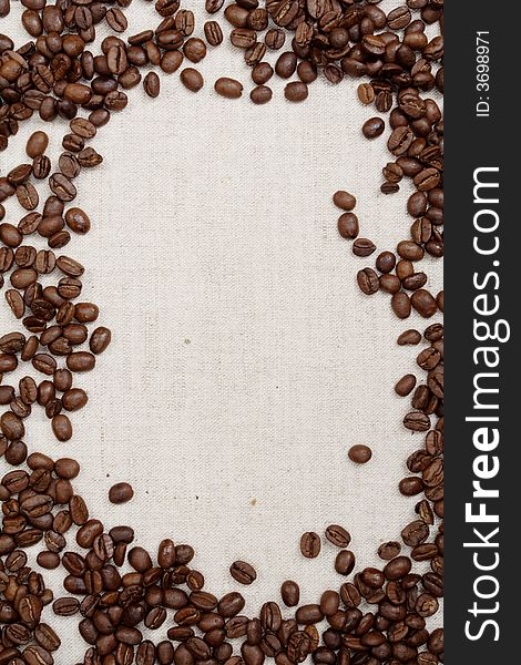 Coffee background: Close-up of a beans, cup, mill. Coffee background: Close-up of a beans, cup, mill