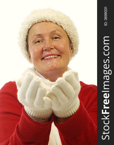 Bright, cheerful portrait of an attractive older woman dressed in winter fashion items. Bright, cheerful portrait of an attractive older woman dressed in winter fashion items