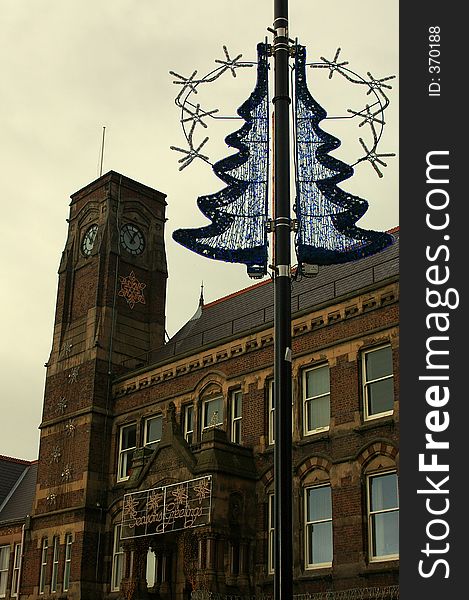 The decorated town hall at St.Helens in Lancashire, during a dark, cloudy day-time, four weeks before Xmas. The decorated town hall at St.Helens in Lancashire, during a dark, cloudy day-time, four weeks before Xmas.