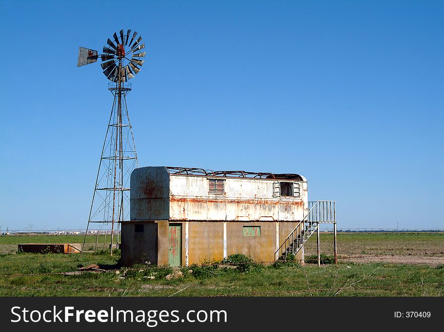 Old farm and windmill