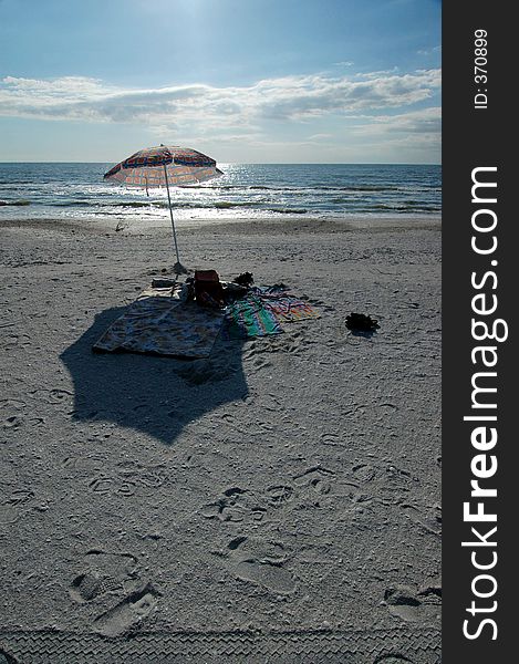 Deserted Beach Umbrella and blanket