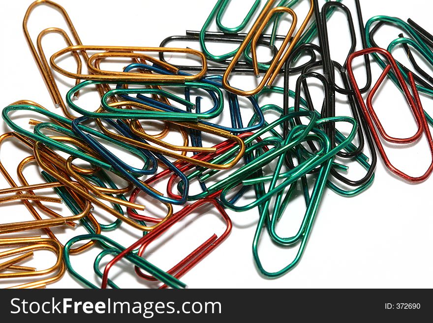 Colorful paper clips, isolated on a white background. Colorful paper clips, isolated on a white background