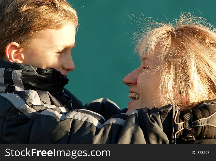 Mother and son sharing a joke.