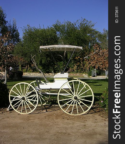 White carriage on a rural backdrop